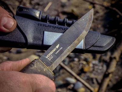 Morakniv Bushcraft Carbon Steel Survival Knife with Fire Starter and Sheath, Black - $56.85 shipped