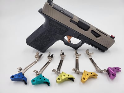 Billet Anodized Glock 17/19 Glock 43 compatible Triggers with Bar - $35 with Code "Triggered2023" 30% off Reg. $45.99 