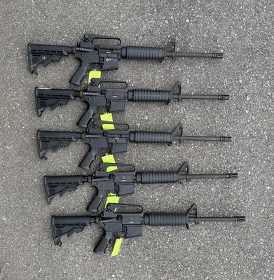 One (1) Police Trade Bushmaster XM15-E2S 556 Nato 30-rds Hand Select Available 16" HBAR Barrel 1:9 Carry Handle Adjustable Stock - $569