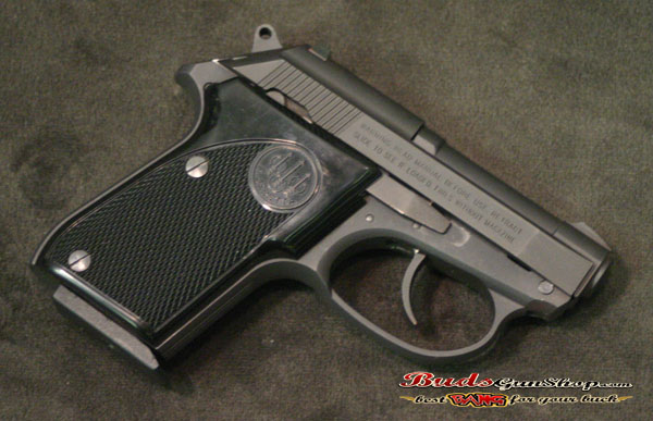 Tomcat .32acp pistol.ﾠ It has a matte black finish, DA/SA trigger, and righ...